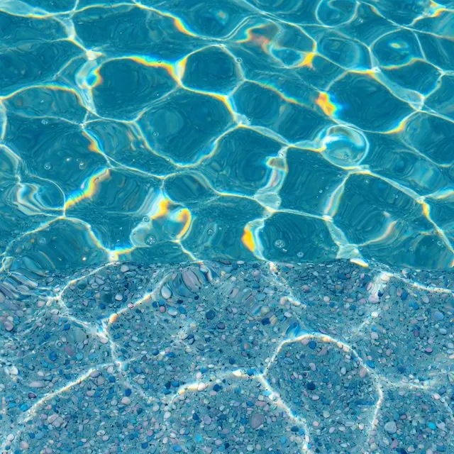 Pool water with a pebble blue interior finish